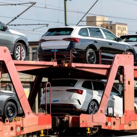 new-cars-transported-by-rail-on-a-flatcar-2026-03-16-23-00-13-utc (1)
